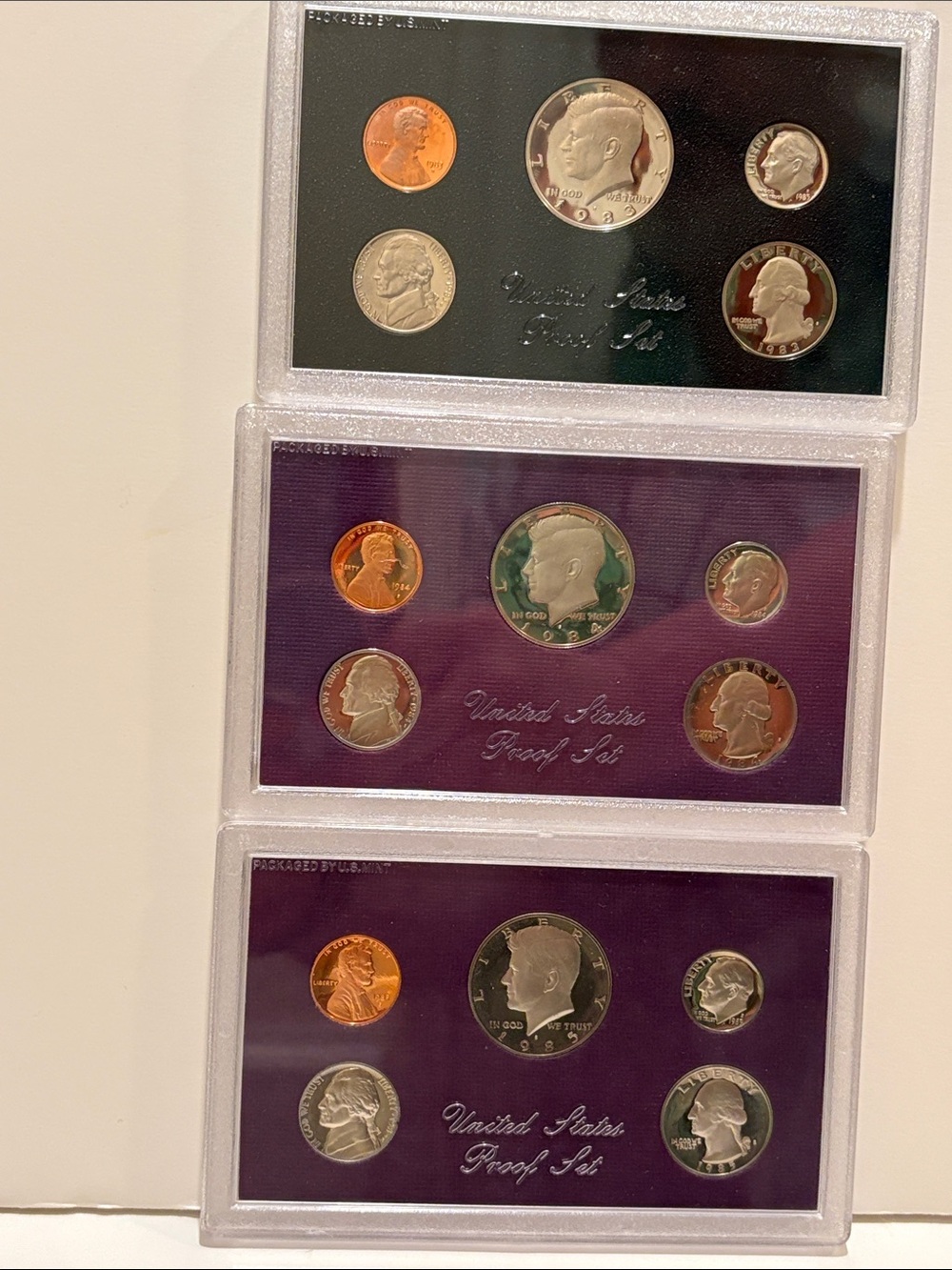US Mint proof coin set: 1983, 1984, 1985.